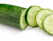 cucumber with slices isolated on the white background