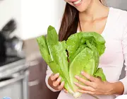 Woman preparing salad
