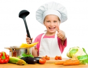 girl with spaghetti and vegetables