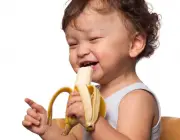 Child with banana.