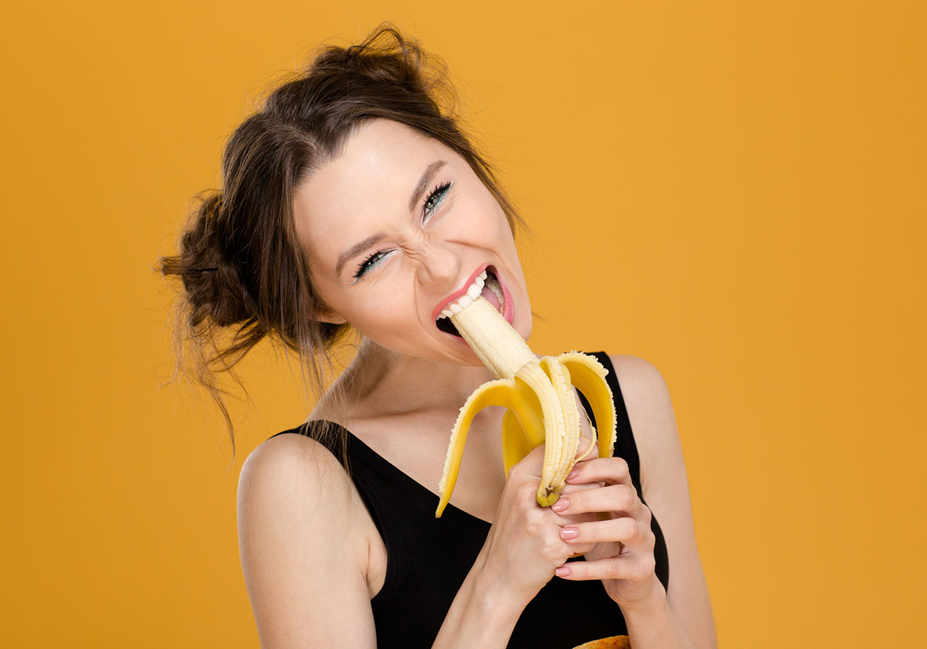Mulher Comendo Banana 